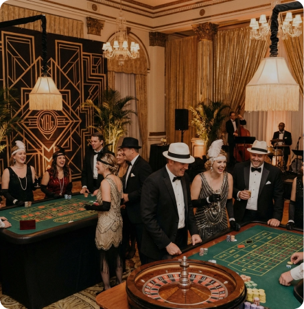 1920s Gatsby–inspired party: Art Deco decor, gold accents, flapper dresses, roulette table